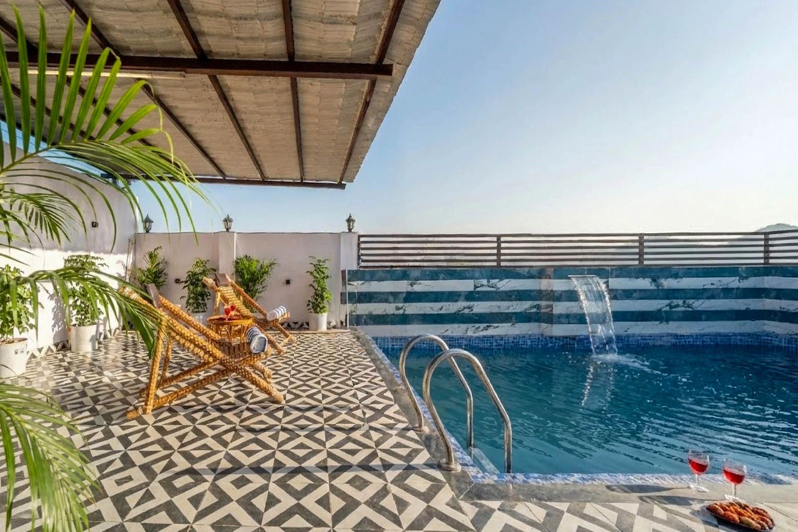 Rooftop pool waterfall feature